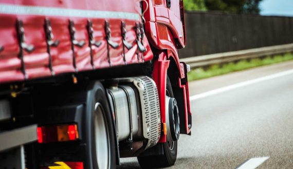 red-truck-on-the-road-PY8RVLW.jpg